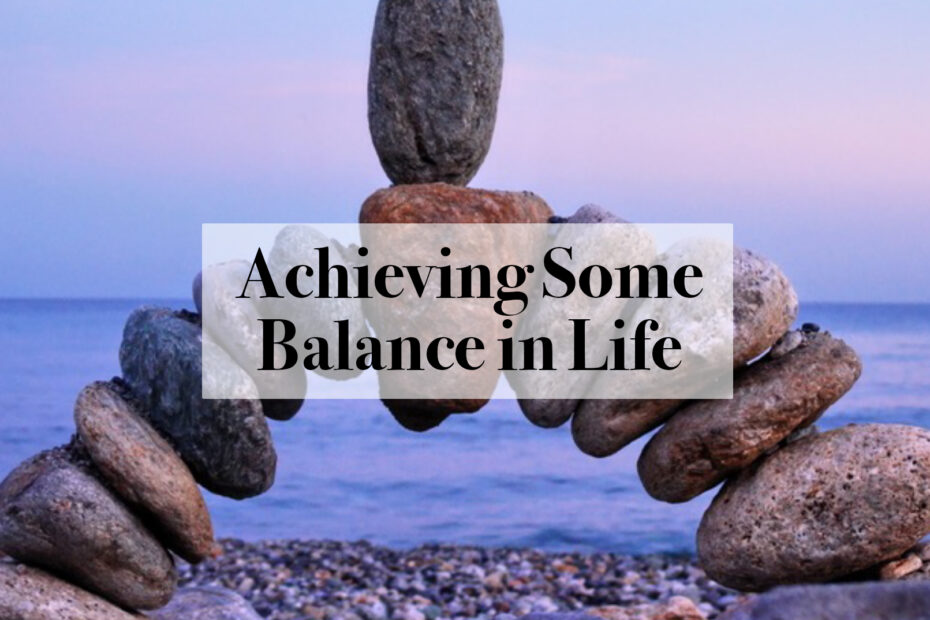 A rock balances in the centre of a bridge of rocks